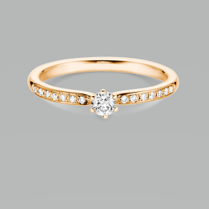 Bild von Solitärring mit Seitenbesatz 585/- Roségold, Ges. 0,25 ct. TW-si Weite 52 Verlobungsring